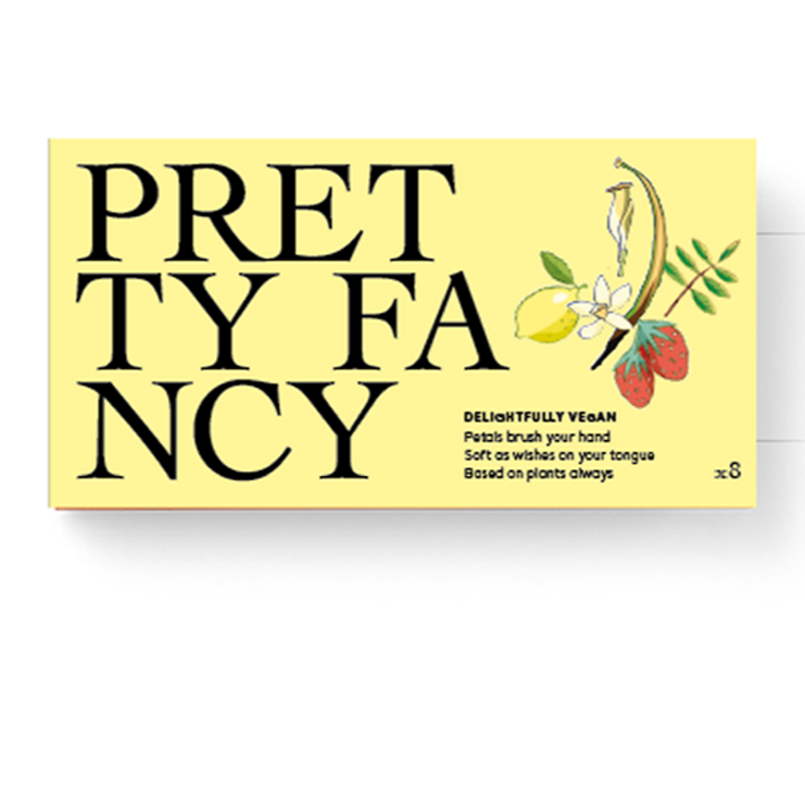Yellow packaging with 'Pretty Fancy' text on a white background