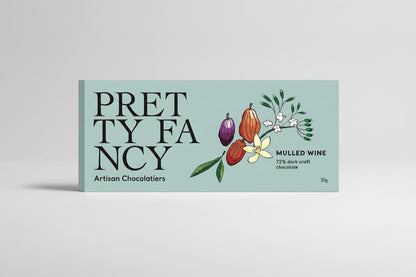 Chocolate bar packaging with 'Pretty Fancy' branding and mulled wine flavor text.